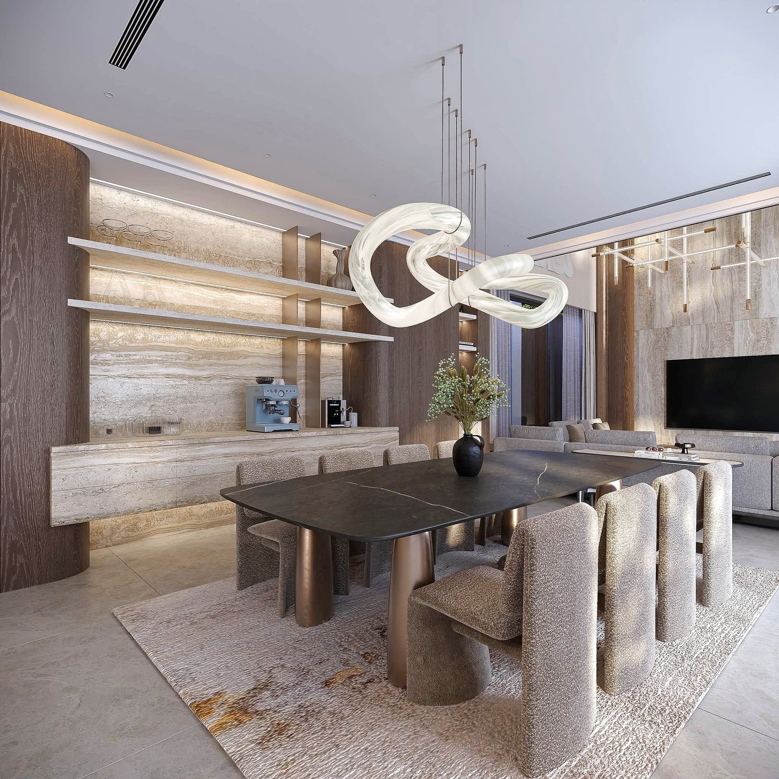 Astera_Villa_Pattaya_10 Modern showroom interior with a dark oval dining table, textured carpet, and wood-paneled walls under warm lighting with a sculptural white light fixture overhead.