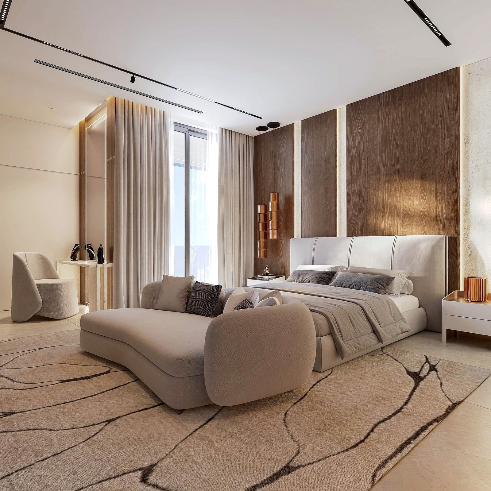 Astera_Villa_Pattaya_11 Luxurious hotel bedroom with beige upholstered seating, a large patterned rug, and wooden paneled walls behind a plush bed.