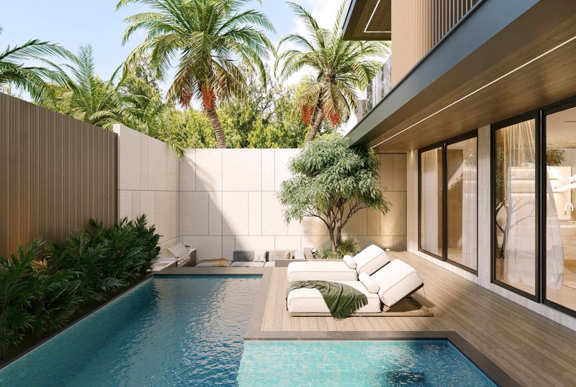 Modern courtyard with a rectangular pool, lounge chairs, tropical palm trees, and a contemporary glass-and-wood house exterior