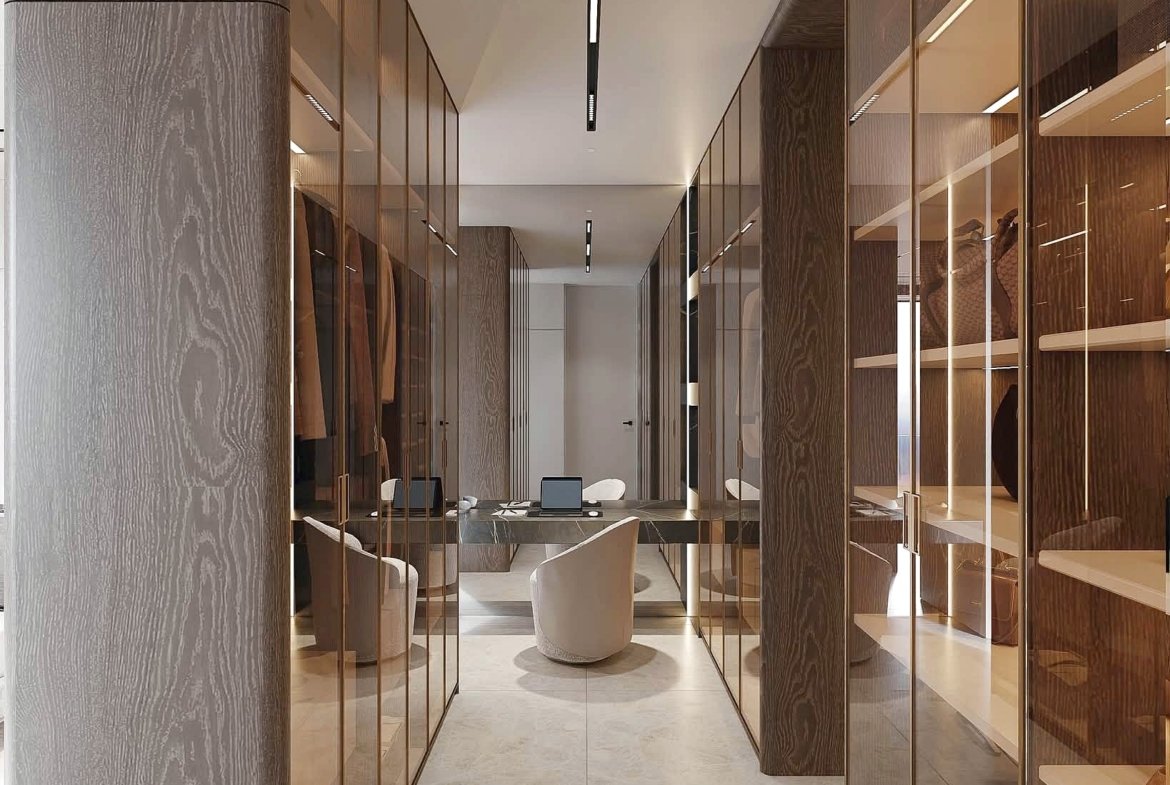 Symmetrical hallway in a modern office: tall wood-and-glass storage cabinets line both sides, a light-gray tiled floor, and seating visible at the far end.
