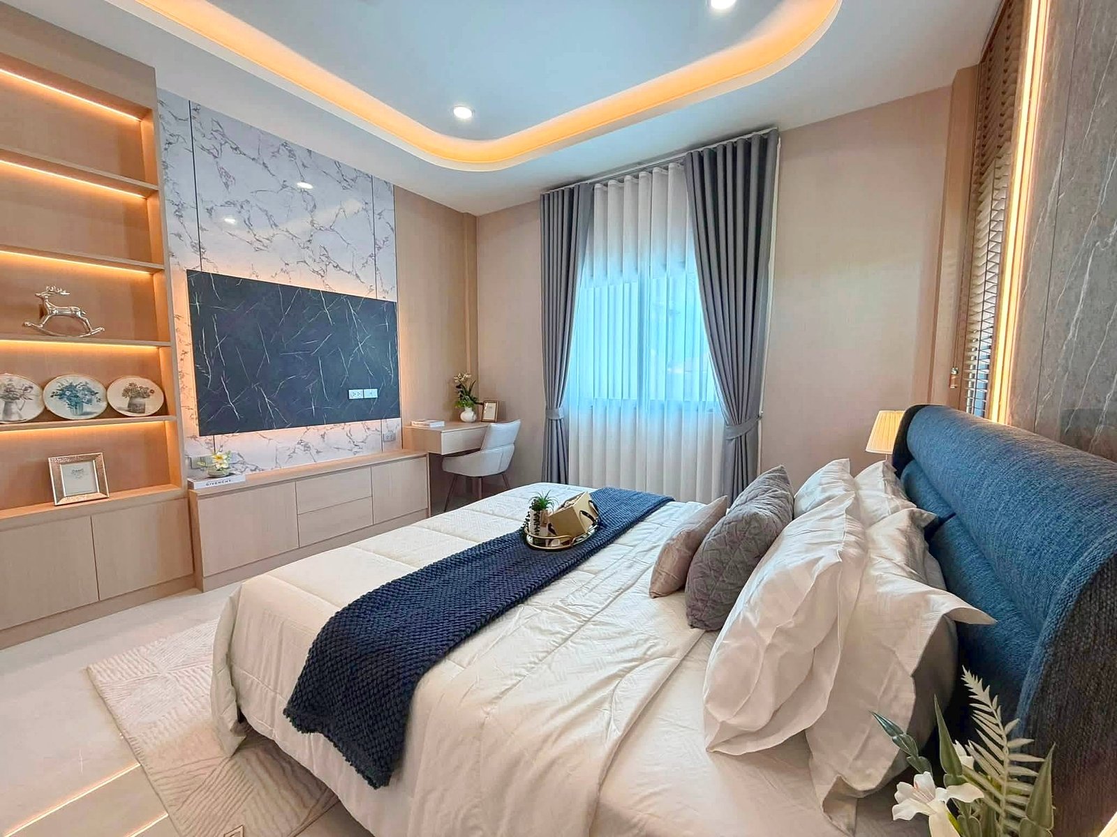 Poolvilla_Khaomakok_Pattaya_Dlh583_19 Contemporary bedroom with two neatly made beds, white linens, and navy bed runners under warm ambient lighting.