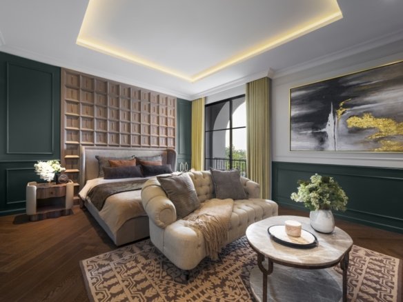 Elegant bedroom with a tufted headboard, dark green wall panels, and a beige tufted sofa by a round marble coffee table.