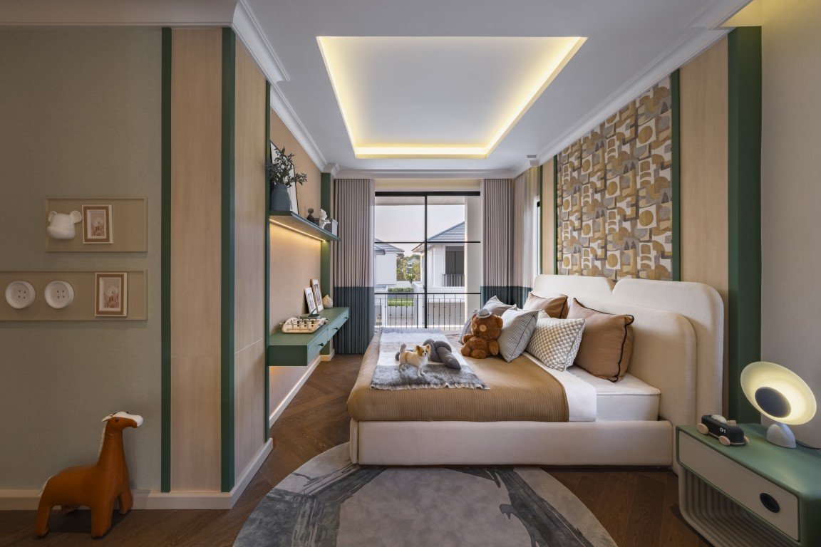 Cozy modern bedroom with beige upholstered bed, geometric wall panel, large window, and warm ceiling light.